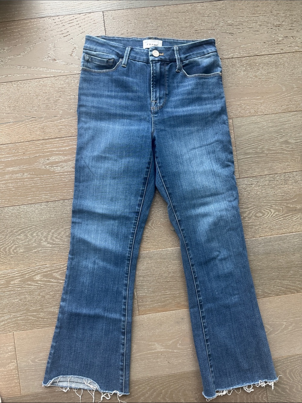 Frame Denim Medium Blue High-Rise Flare Jeans with Raw Hem